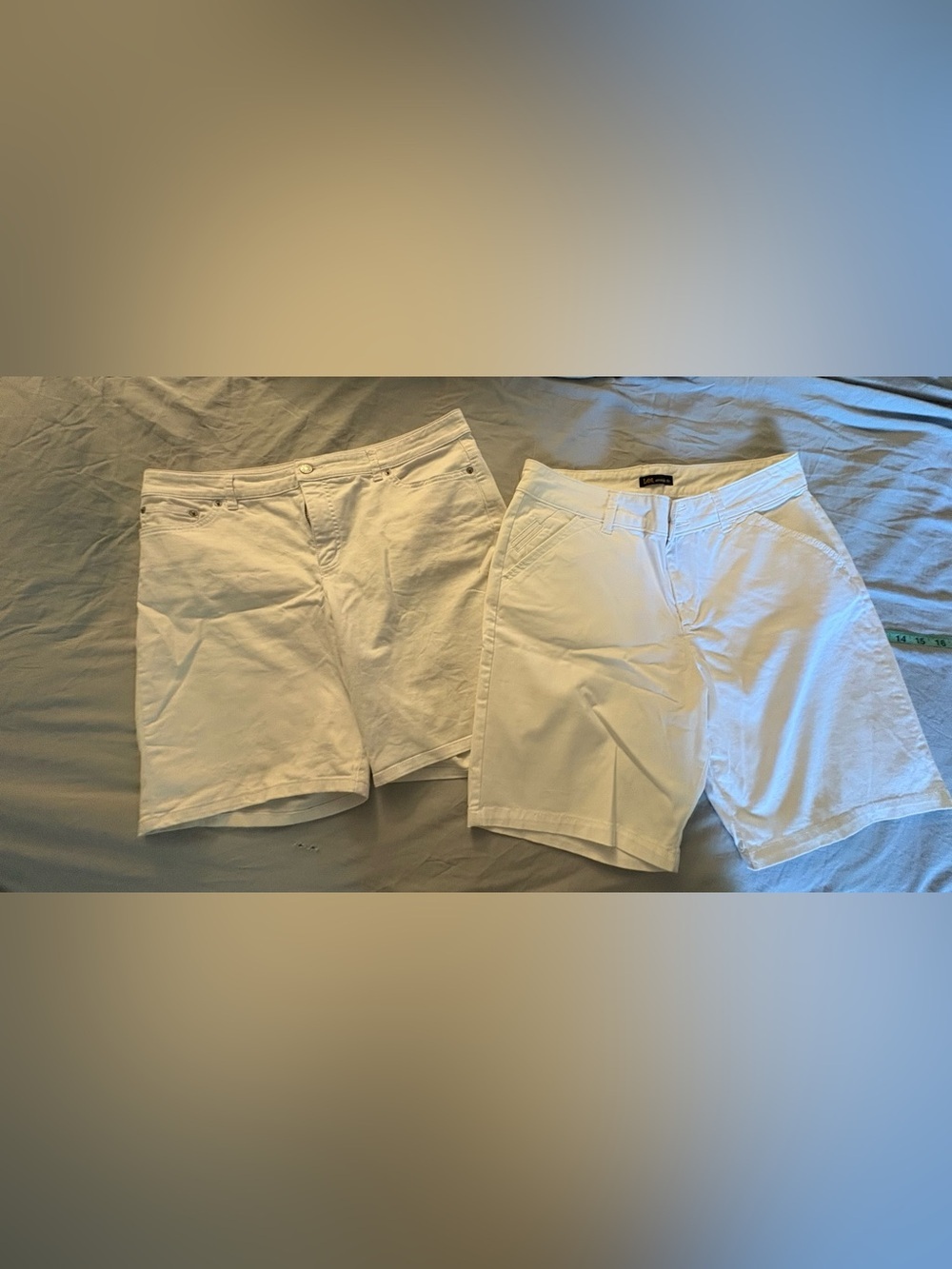 2 Pair white shorts both size 12, both 8 inch inseam Lee @ New.
Chaps @ Like New